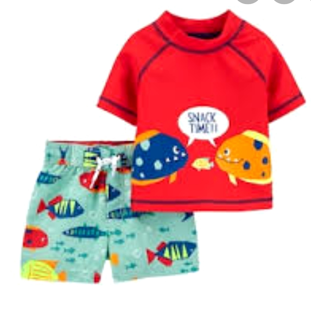 New with tags!Carter's swim trunk / rash guard set
